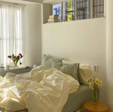 Juego de cama de colores mixtos: verde y amarillo